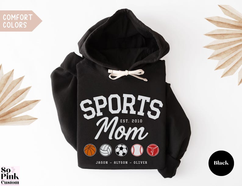 Multiple Sports Mom Hooded Sweatshirt with various sports ball icons, year established and kids names, mixture of college and cursive fonts