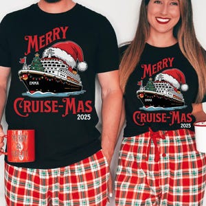 May include: Black t-shirts with a Christmas cruise ship graphic. The design includes a Santa hat, Christmas tree, and the text "MERRY CRUISE-MAS 2025" with the name "EMMA". The models are wearing red and white plaid pajama pants.