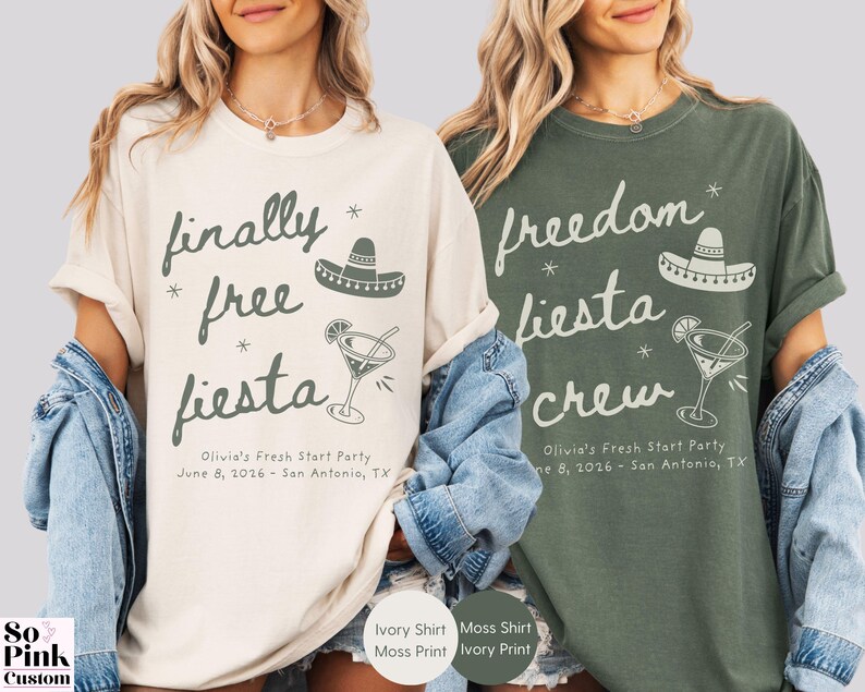 May include: Two short-sleeve crewneck t-shirts, one ivory with dark green text and one moss green with ivory text. Both feature a sombrero, a cocktail glass, and the text "finally free fiesta" or "freedom fiesta crew" with "Olivia's Fresh Start Party June 8, 2026 - San Antonio, TX".
