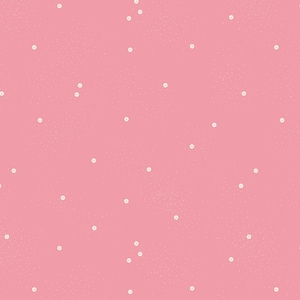 Puede incluir: Tela rosa con un patrón de pequeños puntos blancos dispersos. La tela tiene una textura sutilmente moteada y una regla a lo largo del borde inferior. El texto "Riley Blake Designs" es visible.