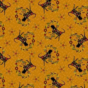 May include: Mustard-colored fabric with a repeating pattern of black dog silhouettes encircled by wreaths of red and green berries and leaves. Small red star shapes and a subtle floral design fill the background. The fabric is measured in inches.