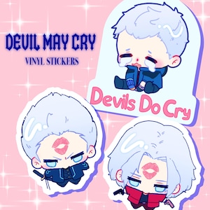 Peut inclure: Ensemble d'autocollants en vinyle avec des illustrations de style anime. Les autocollants présentent des personnages aux cheveux blancs, aux yeux bleus et diverses expressions, dont des larmes et une marque de baiser. Le texte "DEVIL MAY CRY" et "VINYL STICKERS" est affiché.