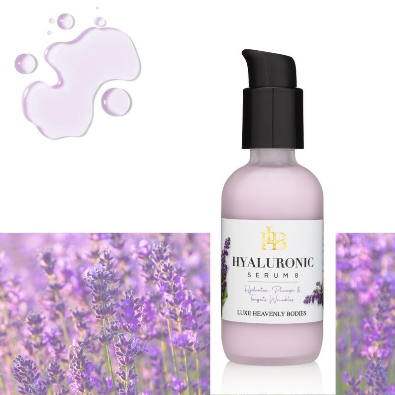 May include: A clear glass bottle with a black pump top filled with a pink liquid. The bottle is labeled "HYALURONIC SERUM" and "LUXE HEAVENLY BODIES". The bottle is sitting on a white surface with a lavender flower background.