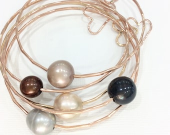 Gold filled bangle with pearl and charm