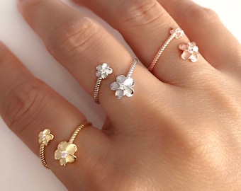 Sterling silver adjustable ring with sparkling cubic zirconias