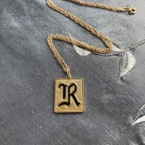 Gold filled initial pendant and chain.