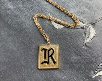 Gold filled initial pendant and chain.