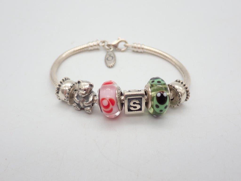 Pandora Bracelet With Pink and White Themed Charms 