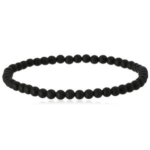 May include: A black beaded bracelet with a simple design.