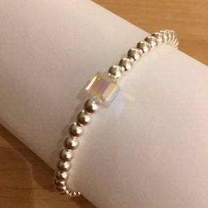 Dainty Sterling Silver Beaded Stretch Bracelet With Austrian Crystal Aurora Borealis Cube Accent