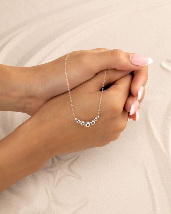 FLOATING BEAD NECKLACE • 14k gold filled, sterling silver or rose gold filled • dainty bead pendant • 7 graduated beads • water resistant