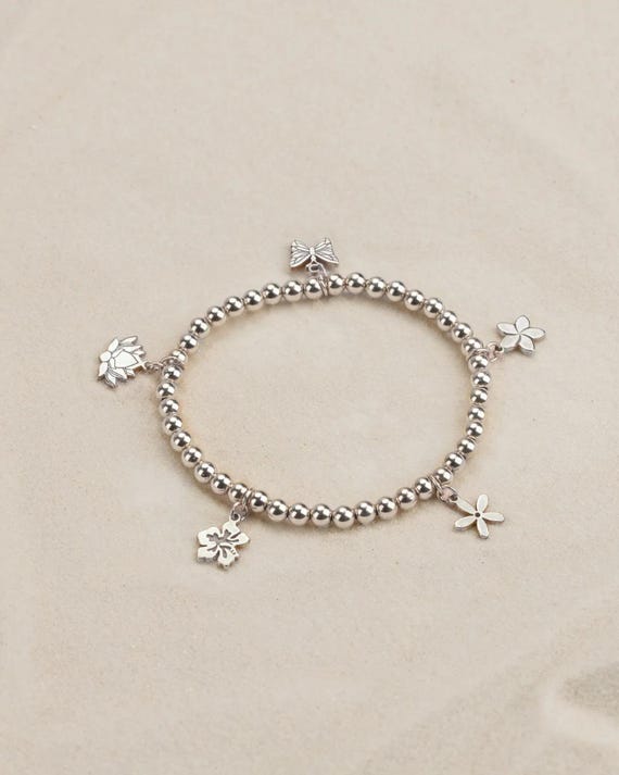 FLOWER CHARM bracelet • 5 charm beach bracelet • hibiscus plumeria lotus butterfly jasmine • Hawaiian jewelry • stretch water resistant