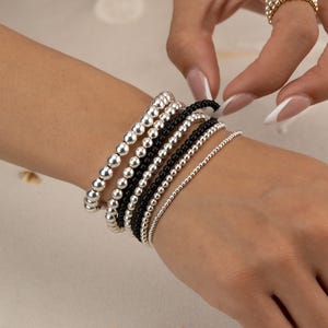 Conjunto de PULSERA DE ÓNIX NEGRO • Pulsera apilable de cuentas • Regalo perfecto para ella • Cuentas curativas genuinas • Apilable, elástica y resistente al agua • BRBP2AP