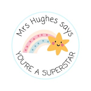 May include: A round sticker with a light blue border features a rainbow and a smiling yellow star. The text "Mrs Hughes says YOU'RE A SUPERSTAR" is written around the edge in a playful font. The design is cheerful and colorful.