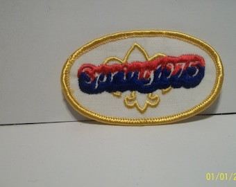 Boy Scouts Of America Spring  With BSA Emblem White, Gold, Red, Blue Embroidered BSA Cloth Patch Looks Unused 1975