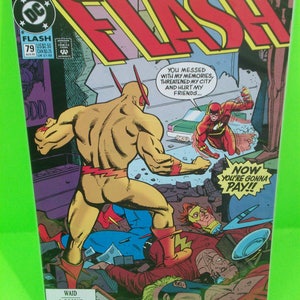 May include: A comic book cover featuring the Flash, a superhero with red and yellow costume, fighting a villain with a yellow costume. The text on the cover reads "FLASH" and "YOU MESSED WITH MY MEMORIES, THREATENED MY CITY AND HURT MY FRIENDS... NOW YOU'RE GONNA PAY!!"
