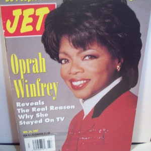 May include: A magazine cover featuring Oprah Winfrey in a red jacket with the title "JET" and the headline "Oprah Winfrey Reveals The Real Reason Why She Stayed On TV". The magazine cover is dated November 24, 1997.