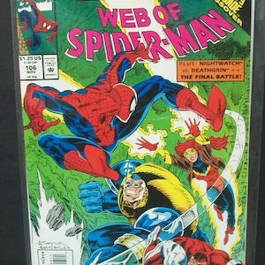 May include: A comic book cover featuring Spider-Man in a red and blue suit, fighting a group of villains. The cover is titled "Web of Spider-Man" and features the text "An Infinity Crusade Crossover".