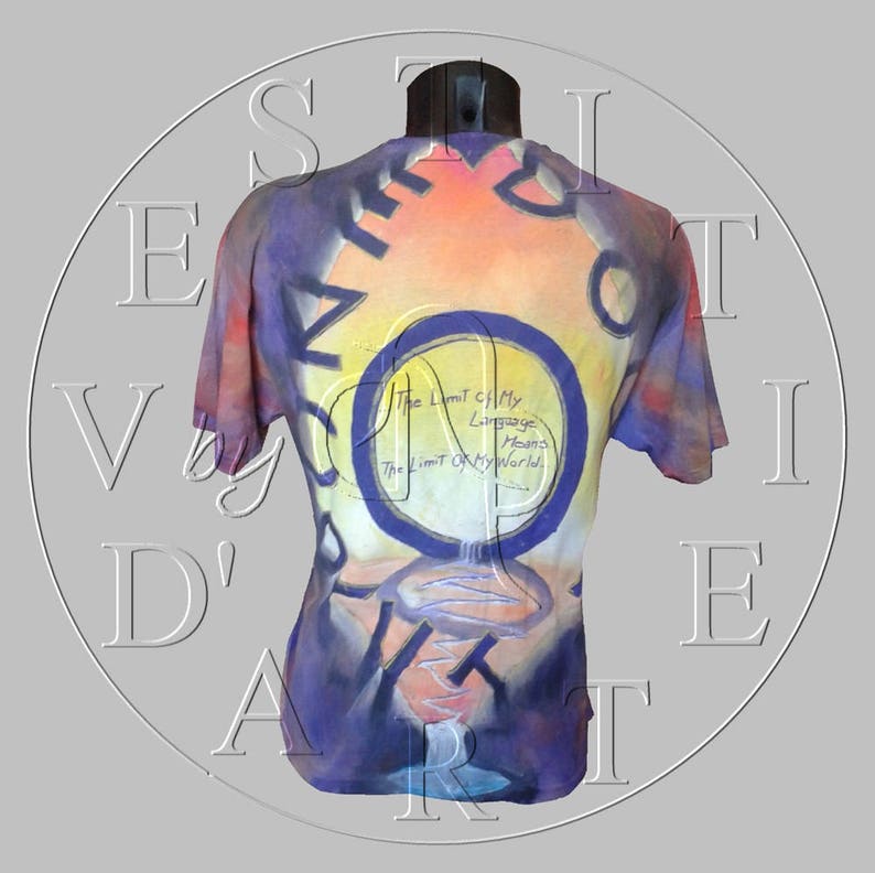 May include: A purple, blue, and yellow tie-dye t-shirt with a painted design on the back. The design features a circle with the text "The Limit of My Language Means The Limit of My World".