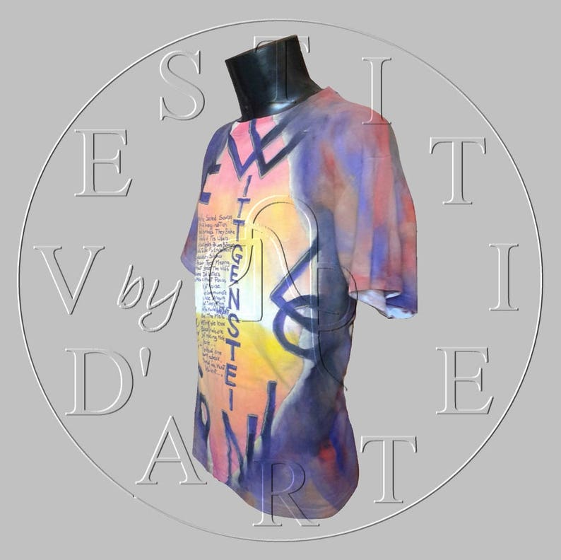 May include: A colorful t-shirt with a tie-dye pattern and a list of song titles printed on the front. The shirt is a vibrant mix of pink, purple, yellow, and orange.