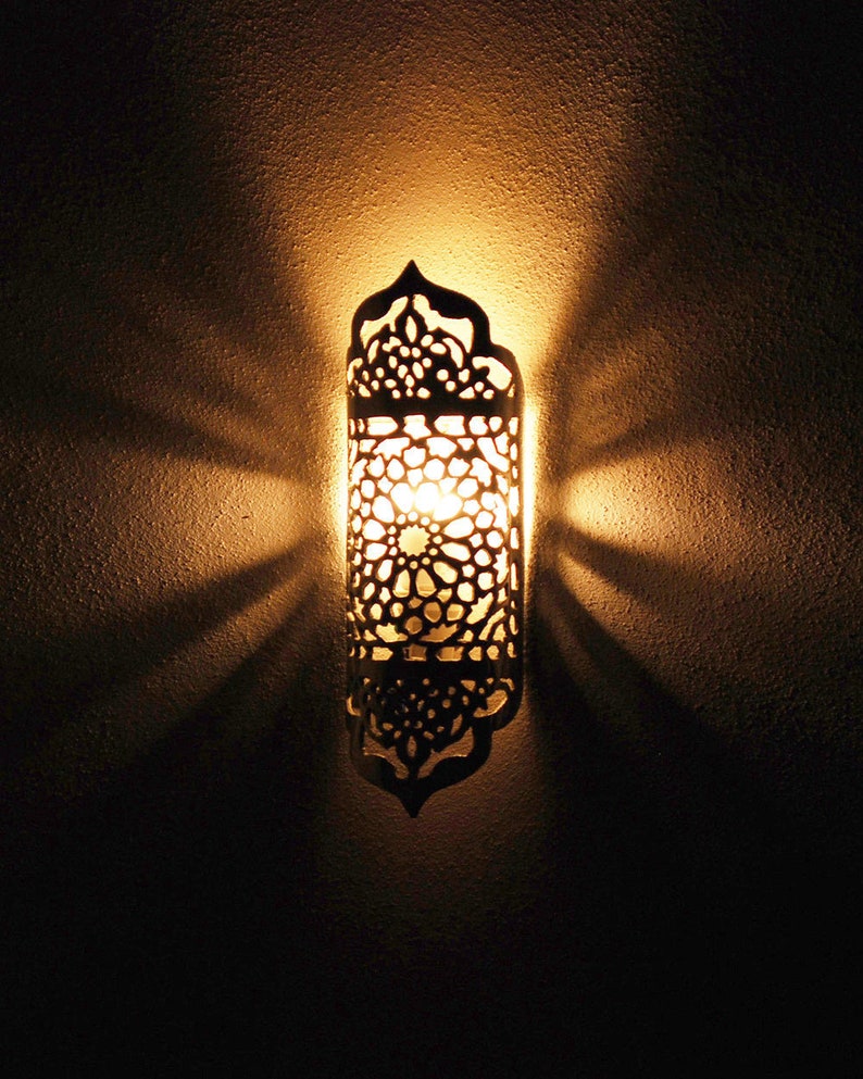 Moroccan wall light sconce: Small Alcazar Geometric Wall Light in lightweight aluminium for use inside, outside in gardens, terraces and patios.  Contains no electrical parts.