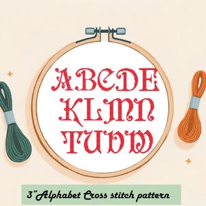 May include: A white embroidery hoop with red cross stitch letters spelling out "ABCDE KLMN TUVW" on a white background. The hoop is surrounded by two spools of embroidery floss, one green and one orange. The text below the hoop reads "3" Alphabet Cross stitch pattern.