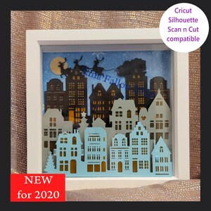 Święty Mikołaj nad dachami w Wigilię Bożego Narodzenia — wielowarstwowy i odpowiedni do cyfrowych formatów cięcia Shadow Box Light Box SVG, Studio i FCM