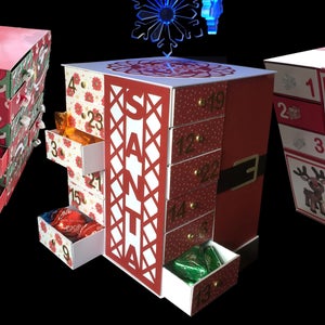 Advent Cube de 24 gavetas - Sil Studio e também formato SVG (com opcional Santa Outfit e recortes de decoração do painel) arquivo de corte para download