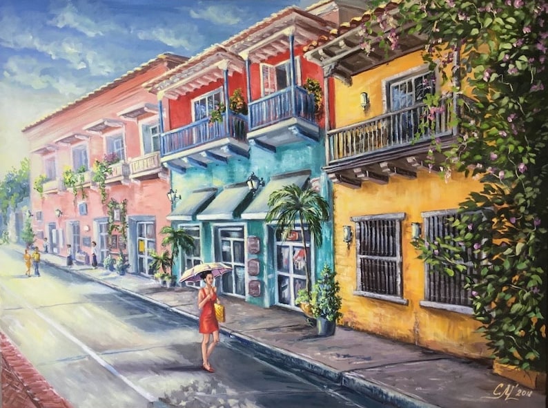 May include: A painting of a colorful street scene in a tropical city. The buildings are painted in shades of pink, red, blue, and yellow. There are balconies with railings and potted plants. A woman in a red dress walks down the street with a yellow umbrella.