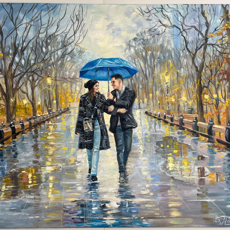 A romantic commissioned oil painting featuring a bride and groom embracing under a shared umbrella. The impressionistic canvas shows the couple walking down a scenic park alley with soft, blended paint textures.