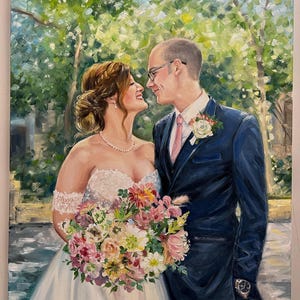 Hand-painted custom marriage anniversary artwork in oil, featuring a newlywed couple. The detailed canvas highlights the intricate white lace pattern of the bridal gown and the textures of the flower bouquet.