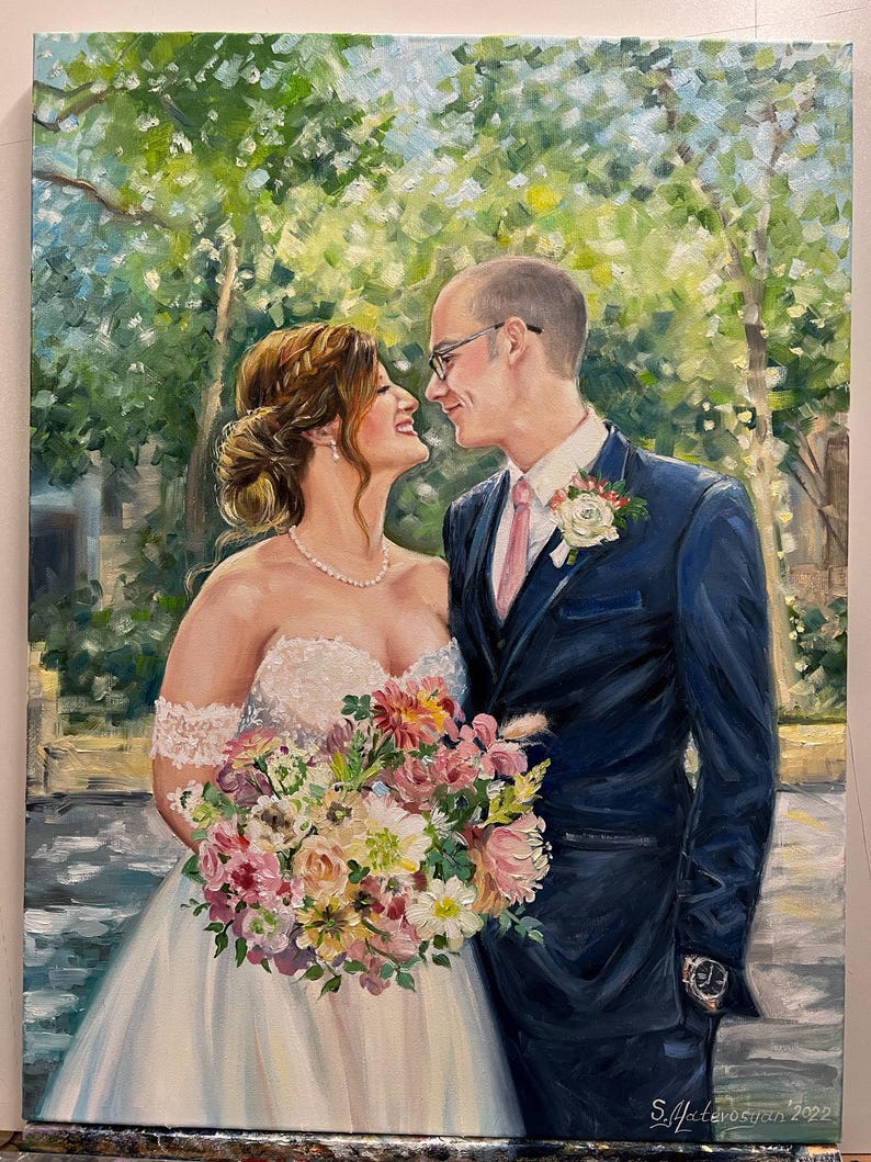 Hand-painted custom marriage anniversary artwork in oil, featuring a newlywed couple. The detailed canvas highlights the intricate white lace pattern of the bridal gown and the textures of the flower bouquet.
