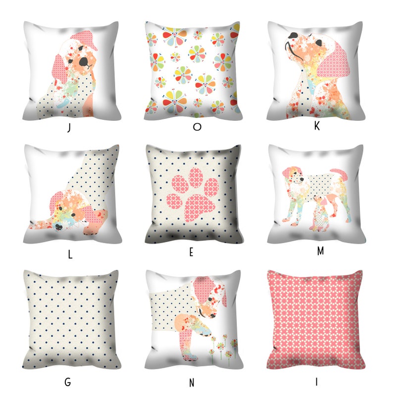 May include: Nine different pillow designs featuring a dog illustration. The pillows are white with various patterns including polka dots, floral, and paw prints. The dog illustrations are in a patchwork style with pink, yellow, and blue colors.