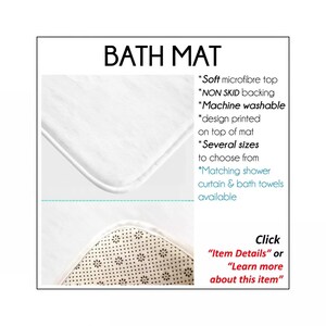 The image is a product detail explanation of an ozscape designs bath mat. It features a close-up of the mat, along with a description of its features, such as the soft microfibre top, non-skid backing, and machine washable design. The mat is available in several sizes, and it is designed to match shower curtains and bath towels. The advertisement also includes a call-to-action for customers to click on "Item Details" or "Learn more about this item" to learn more about the product.