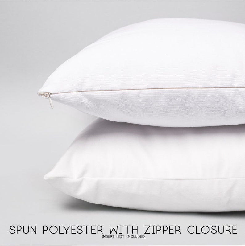 May include: Two white pillow covers with a zipper closure. The pillow covers are made of spun polyester.