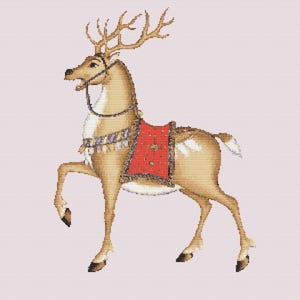 May include: A detailed illustration of a reindeer with large antlers, wearing a red saddle and decorative harness. The reindeer is posed with one leg raised, set against a light pink background. The artwork has a cross-stitch appearance.