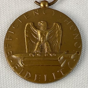 3 United States Military Service Medals- Good Conduct, Veterans of Foreign Wars of the United States and National Defense Medal with Ribbon