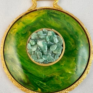 Vintage Small Round Hand or Dressing Table Mirror with Goldtone Frame and Handle and a Green Glass Design on the Reverse