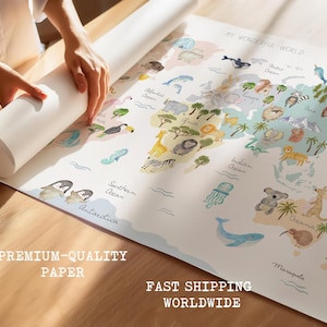 K&ouml;nnte beinhalten: Ein farbenfroher Weltkarten-Poster mit Illustrationen von Tieren und Kontinenten. Das Poster tr&auml;gt den Titel "Meine wunderbare Welt" und enth&auml;lt die Namen der Ozeane.