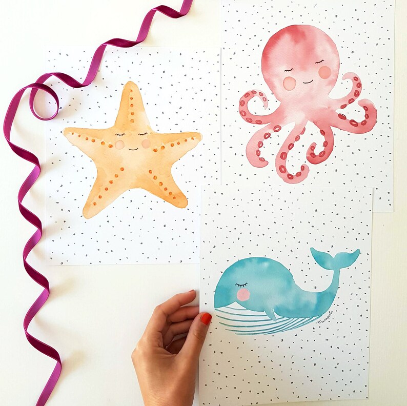 May include: Three watercolor illustrations of sea creatures on white backgrounds with black polka dots. The illustrations are of a yellow starfish, a pink octopus, and a blue whale.
