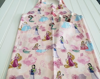 Disney Princess Child Apron, Pink Kids Cooking Apron with Divided Pocket