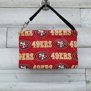 Minibolso de mano de los San Francisco 49ers, cartera de mano de los 49ers, minibolso de los 49ers, minibolso de viaje de los 49ers, minibolso para la noche de juego de los 49ers, mochila de los 49ers
