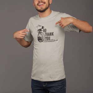 May include: A light grey t-shirt with a black and white graphic of a robot with the text "No Thank You".