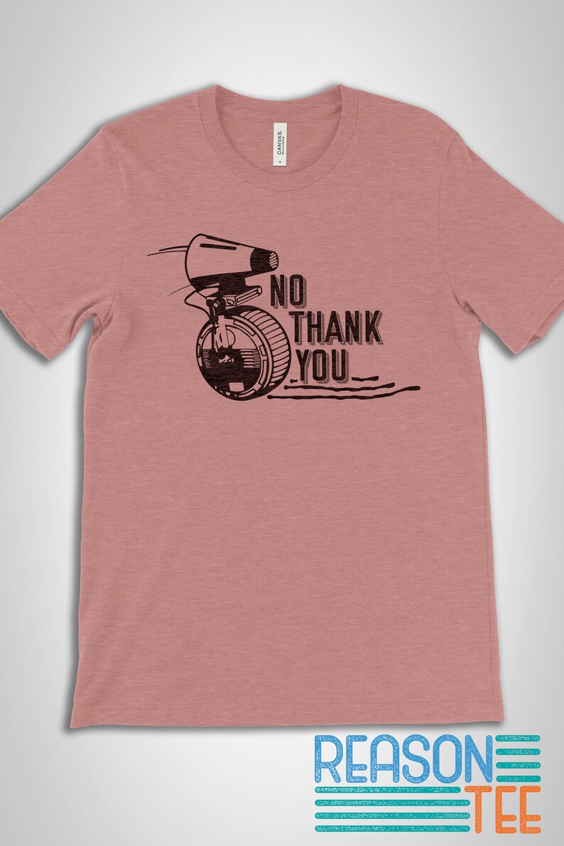 May include: A heather pink t-shirt with a black graphic of a droid from Star Wars with the text "NO THANK YOU".