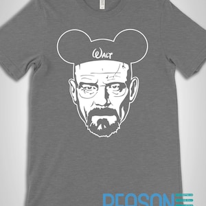 May include: A gray t-shirt with a white graphic of Walter White from the TV show Breaking Bad wearing Mickey Mouse ears. The text "Walt" is written on the ears.
