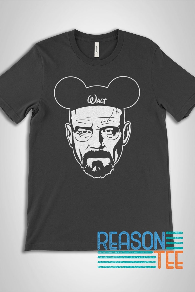 May include: A dark grey t-shirt with a white graphic of Walter White from the TV show Breaking Bad wearing Mickey Mouse ears. The text "Walt" is on the headband of the ears.