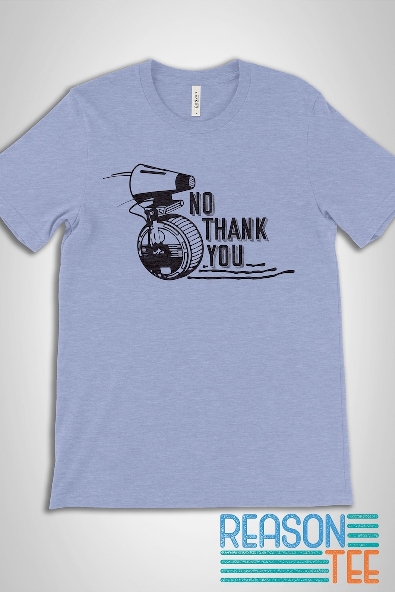 May include: A light blue t-shirt with a black and white graphic of a droid from Star Wars with the text "NO THANK YOU".