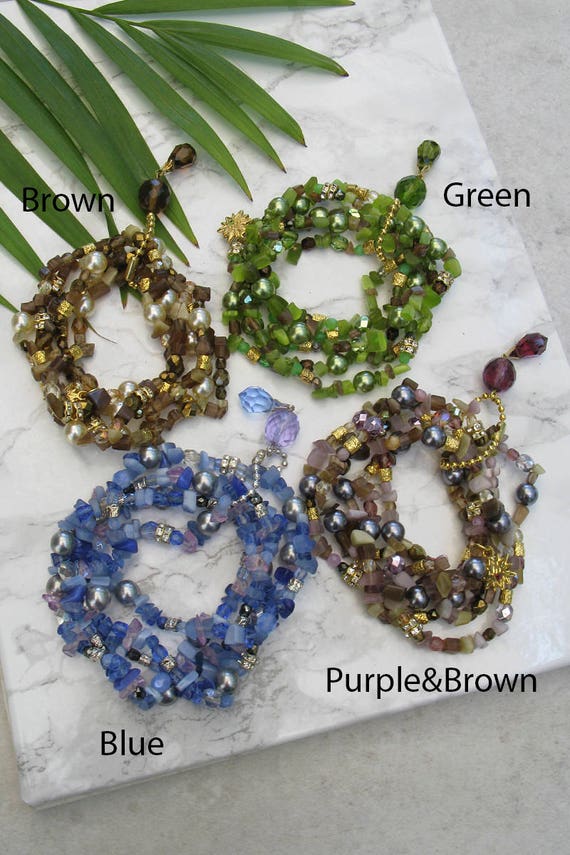 11 set di braccialetti elasticizzati con perline di semi di boho all'ingrosso