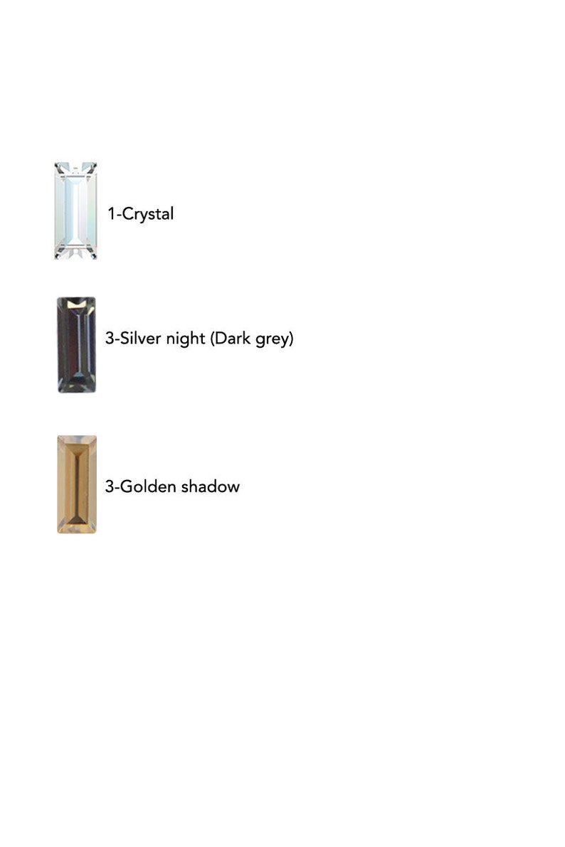 Puede incluir: Tres piedras rectangulares de vidrio en diferentes colores: transparente, gris oscuro y marr&oacute;n. Las piedras est&aacute;n etiquetadas como "1-Crystal", "3-Silver night (Dark grey)" y "3-Golden shadow".