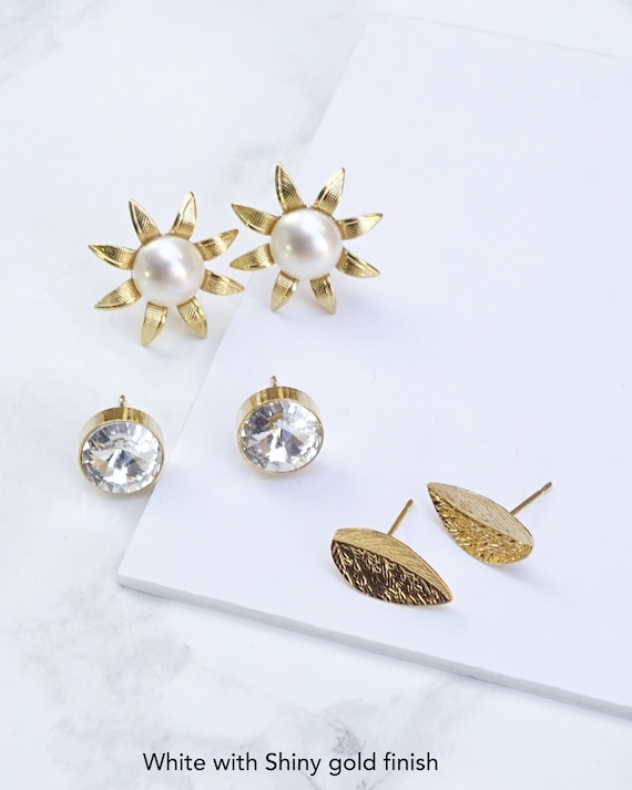 Star Stud Earring Set with Steel Posts and Rhinestone Center Pack of 6 Pair Star Stud Earring Set with Steel Posts and Rhinestone Center Pack of 6 Pair